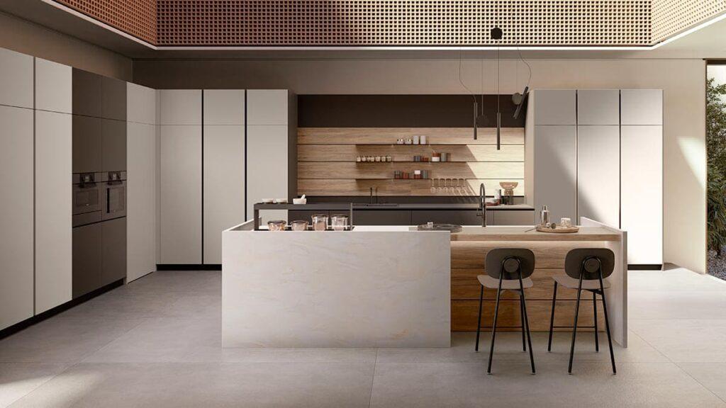 a kitchen with a bar and stools