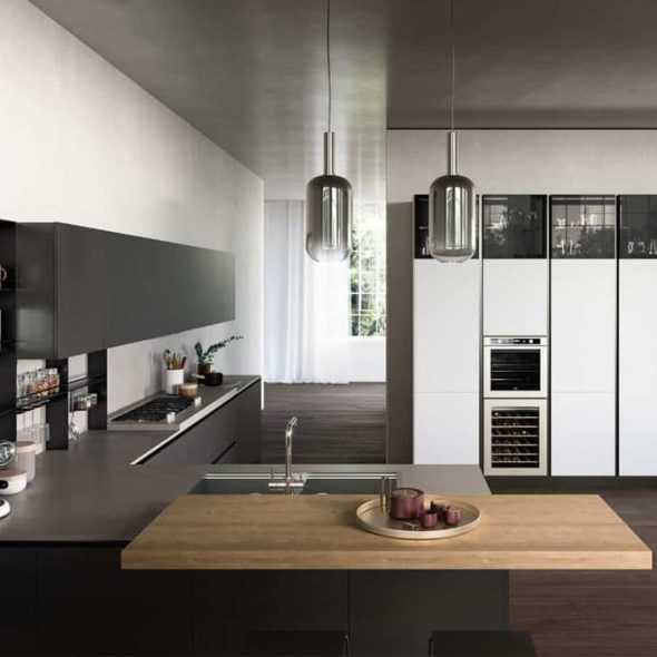 a kitchen with a countertop and white cabinets