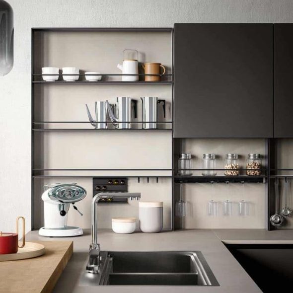 a kitchen with a sink and shelves