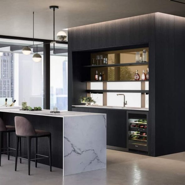 a bar with a marble counter and stools