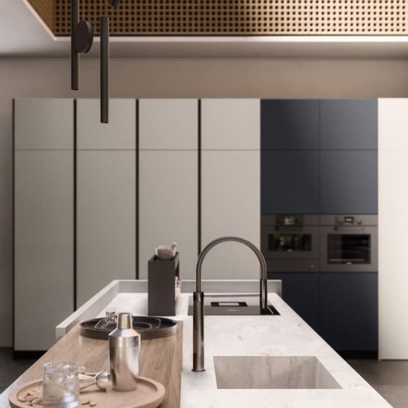 a kitchen with white cabinets and a countertop